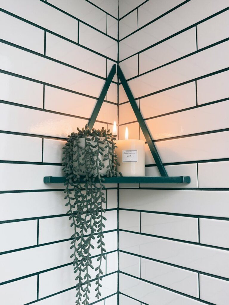 Minimalist corner floating shelf with hidden L-brackets for space-saving decor