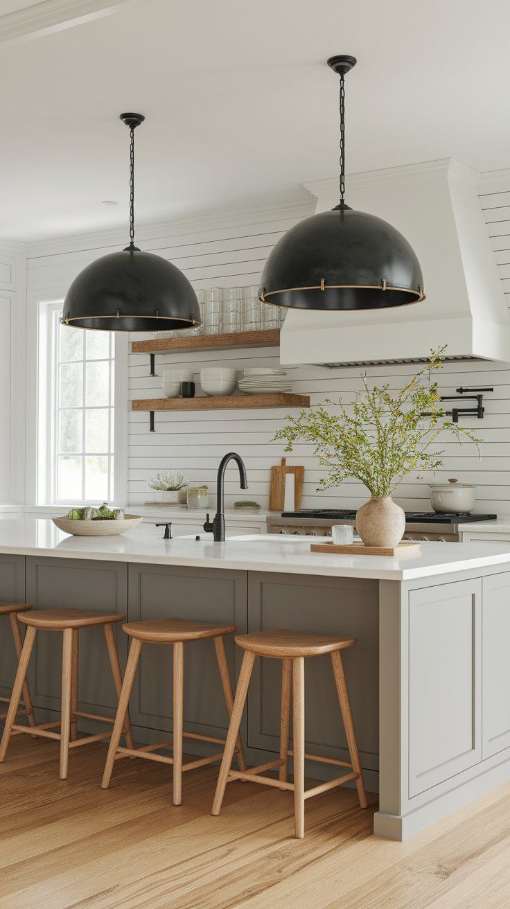 Industrial pendant lights adding modern edge to rustic kitchen island